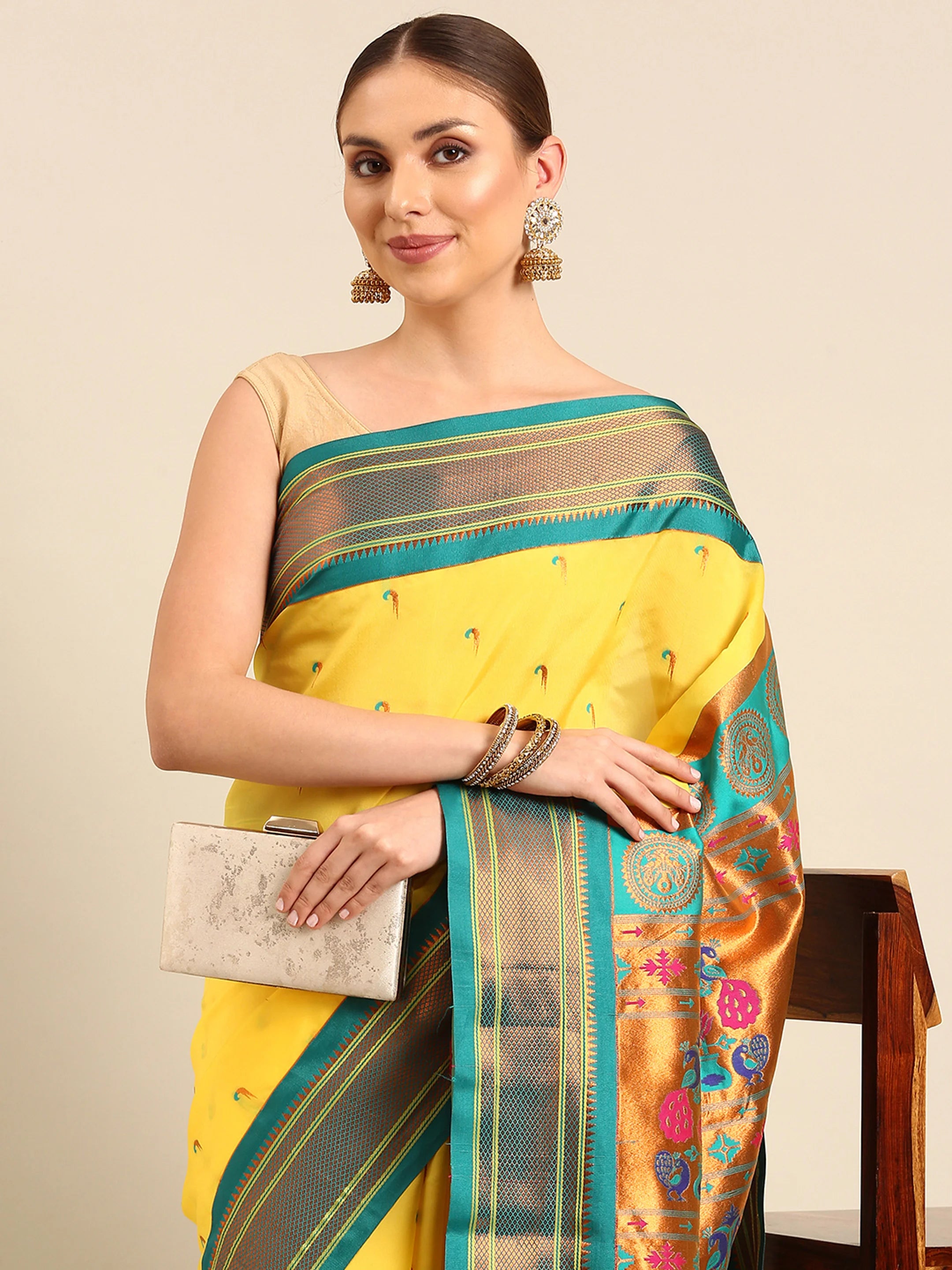 Muniya paithani saree silk blend in yellow and rama with parrot motif zari work - closeup view showing fabric and zari work for wedding wear