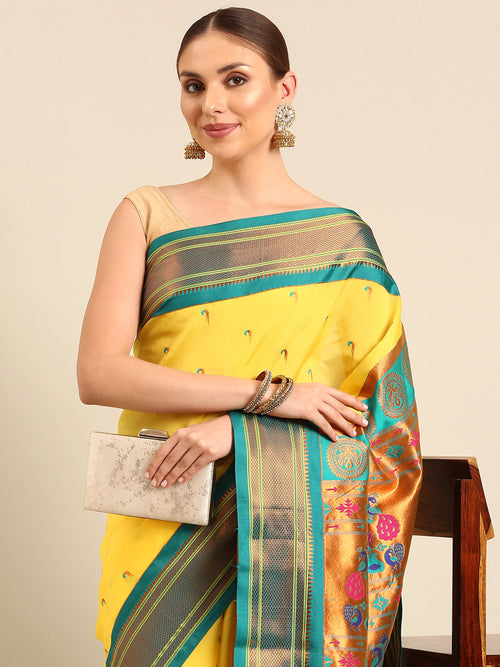 Muniya paithani saree soft silk in yellow and rama with parrot motif zari work - closeup view showing fabric and zari work for wedding wear