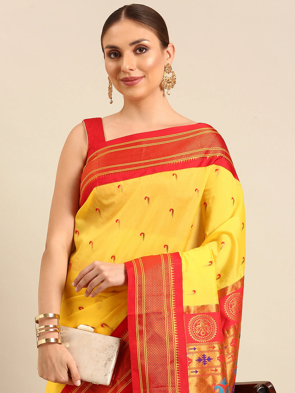 Muniya paithani saree silk blend in yellow and red with parrot motif zari work - closeup view showing fabric and zari work for wedding wear