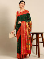 Muniya paithani saree silk blend in bottle green and red with floral meena butti - front view for wedding wear