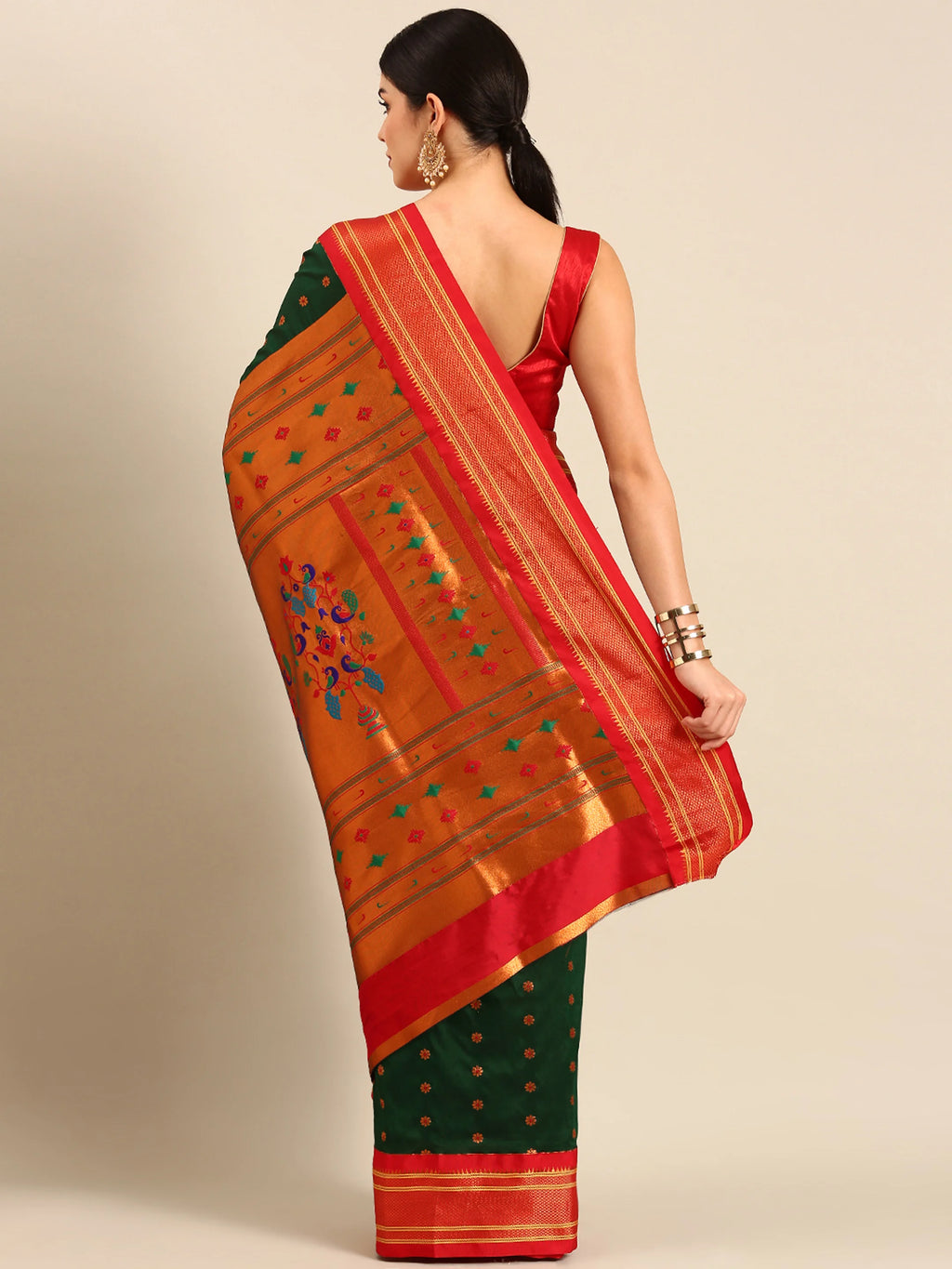 Muniya paithani saree silk blend in bottle green and red with floral meena butti - back view showing pallu and border for wedding wear