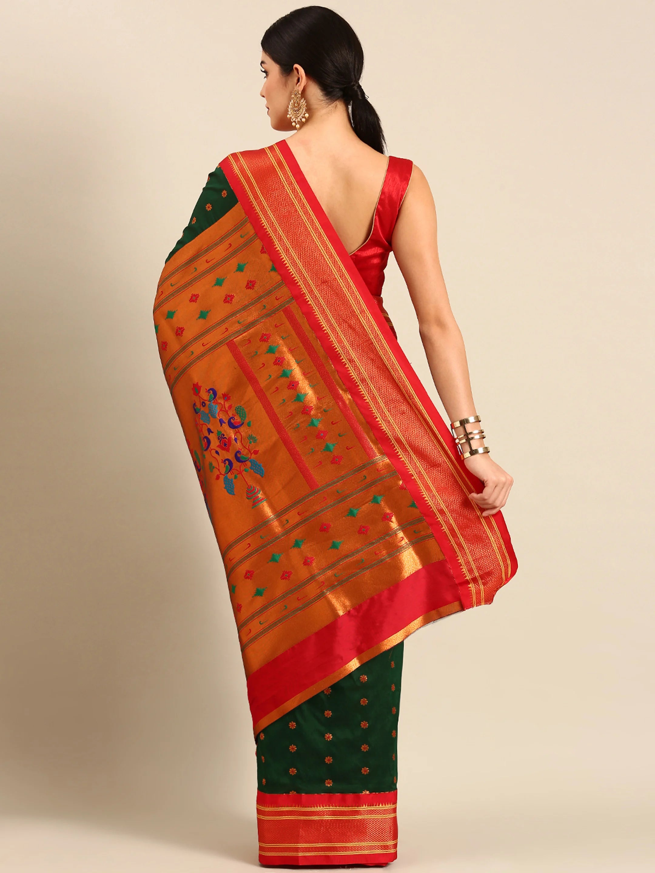 Muniya paithani saree silk blend in bottle green and red with floral meena butti - back view showing pallu and border for wedding wear