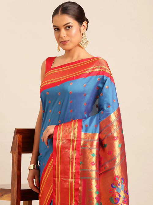 Muniya paithani saree soft silk in firozi and red with floral meena butti - closeup view showing fabric and zari work for wedding wear