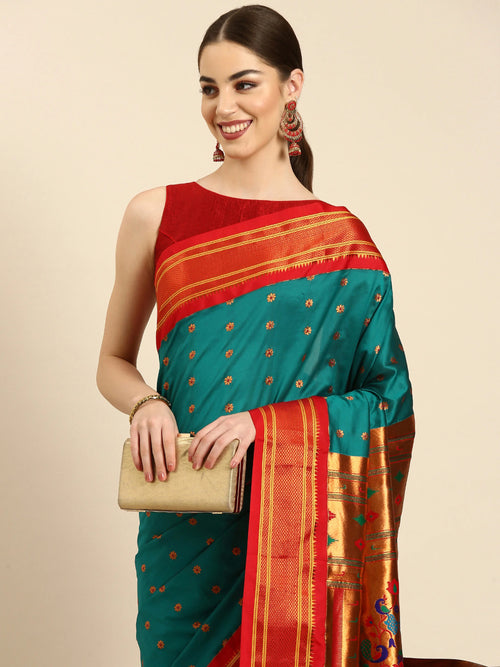 Muniya paithani saree soft silk in rama and red with floral meena butti - closeup view showing fabric and zari work for wedding wear