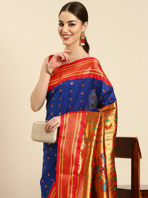 Muniya paithani saree soft silk in royal blue and red with floral meena butti - closeup view showing fabric and zari work for wedding wear