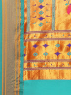 Muniya paithani saree silk blend in saffron and rama with floral meena butti - pallu detail showing woven motif design for wedding wear