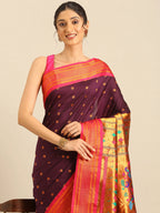 Muniya paithani saree silk blend in wine and pink with floral meena butti - closeup view showing fabric and zari work for wedding wear