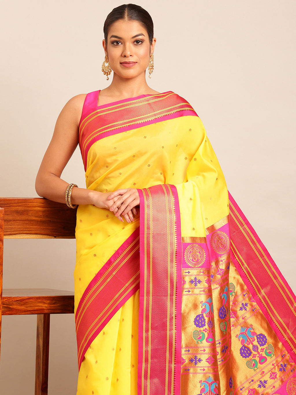 Maharani paithani saree silk blend in yellow & pink with polka butta design - closeup view for weading party and festival
