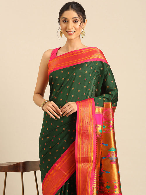 Double pallu paithani saree soft silk in bottle green and pink with chakra phool meena butti - closeup view showing fabric and zari work for party wear