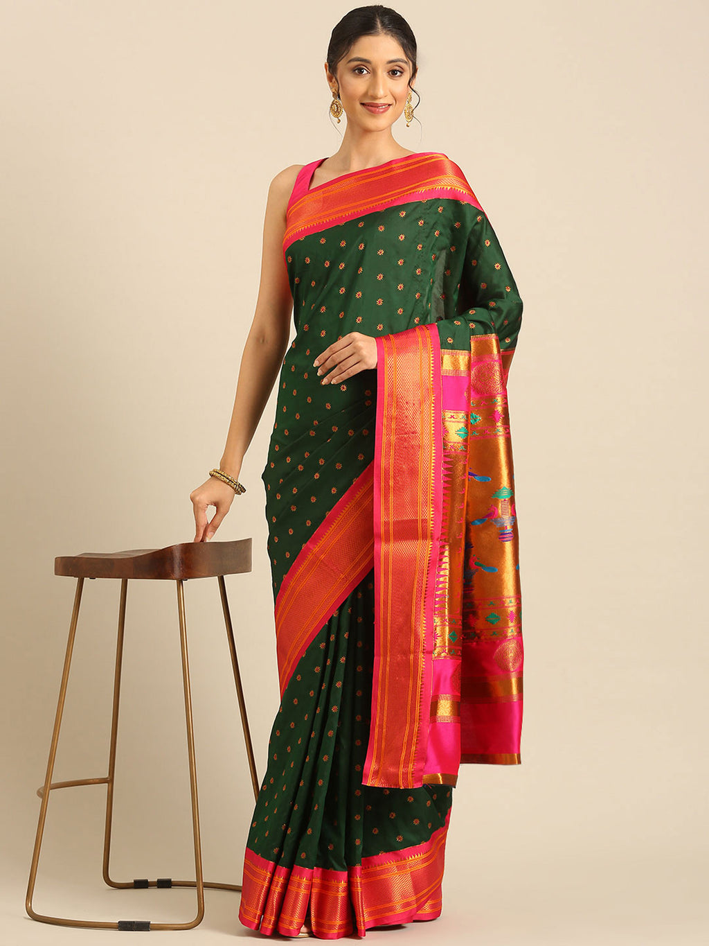 Double pallu paithani saree silk blend in bottle green and pink with chakra phool meena butti - styled model view for party wear
