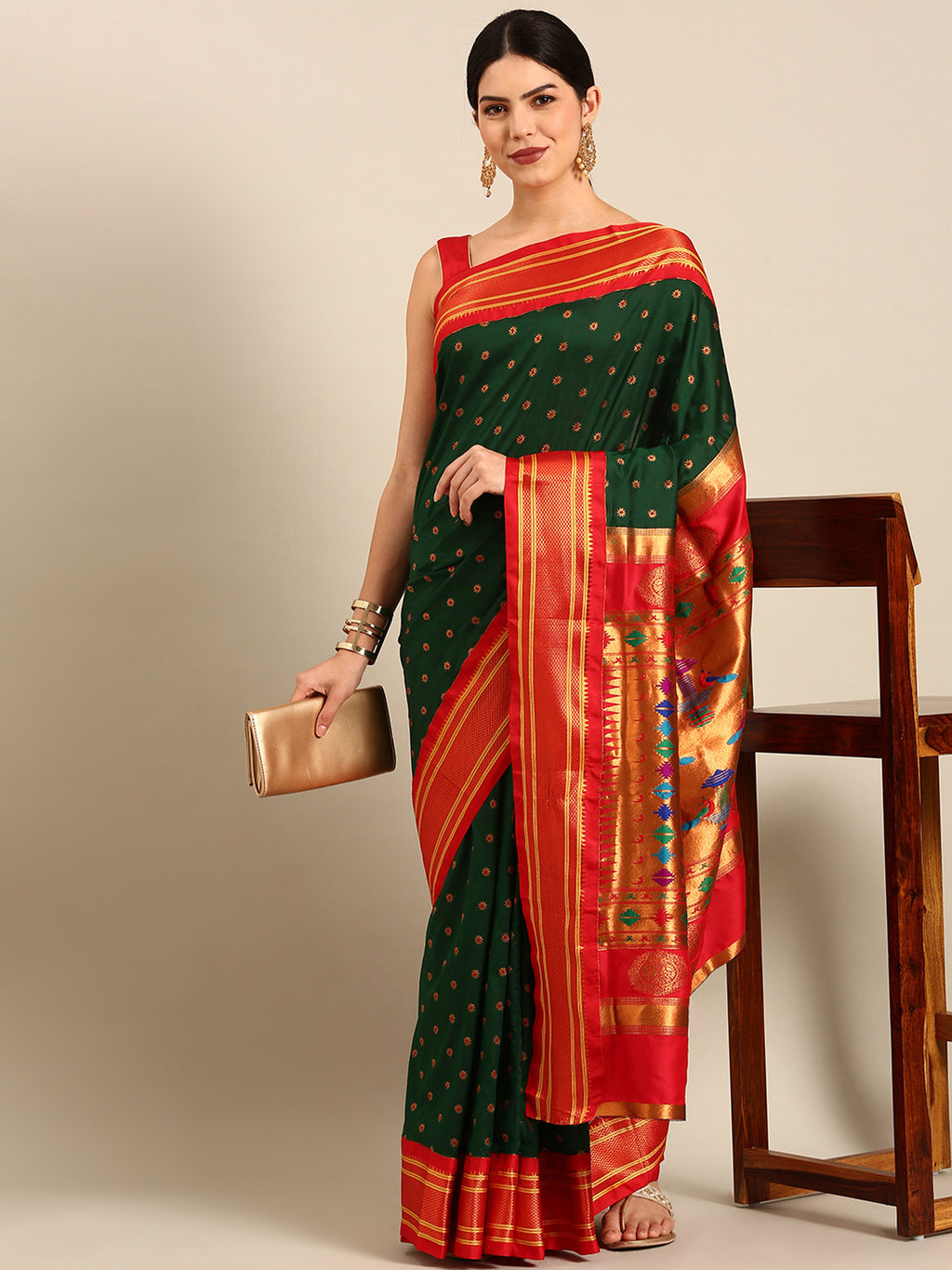 Double pallu paithani saree silk blend in bottle green and red with chakra phool meena butti - front view for party wear