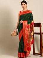 Double pallu paithani saree silk blend in bottle green and red with chakra phool meena butti - front view for party wear