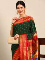 Double pallu paithani saree silk blend in bottle green and red with chakra phool meena butti - closeup view showing fabric and zari work for party wear