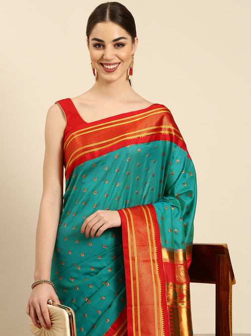 Double pallu paithani saree soft silk in chintamani and red with chakra phool meena butti - closeup view showing fabric and zari work for party wear