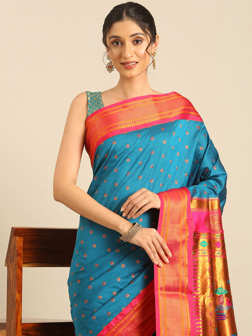 Double pallu paithani saree soft silk in firozi and pink with chakra phool meena butti - closeup view showing fabric and zari work for party wear
