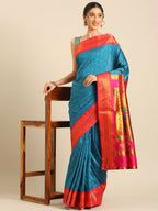 Double pallu paithani saree silk blend in firozi and pink with chakra phool meena butti - styled model view for party wear