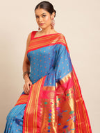 Double pallu paithani saree silk blend in firozi and red with chakra phool meena butti - closeup view showing fabric and zari work for party wear