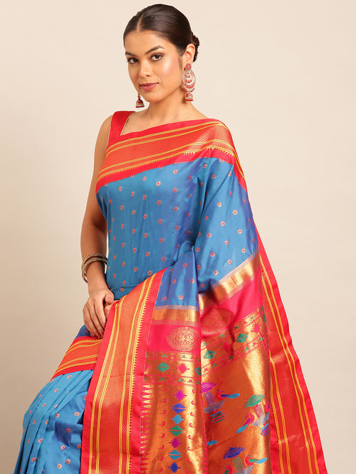 Double pallu paithani saree soft silk in firozi and red with chakra phool meena butti - closeup view showing fabric and zari work for party wear