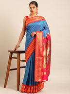 Double pallu paithani saree silk blend in firozi and red with chakra phool meena butti - styled model view for party wear