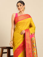 Double pallu paithani saree silk blend in mustard yellow and pink with chakra phool meena butti - closeup view showing fabric and zari work for party wear