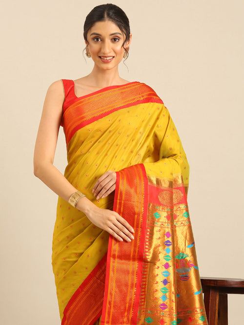 Double pallu paithani saree soft silk in mustard yellow and red with chakra phool meena butti - closeup view showing fabric and zari work for party wear