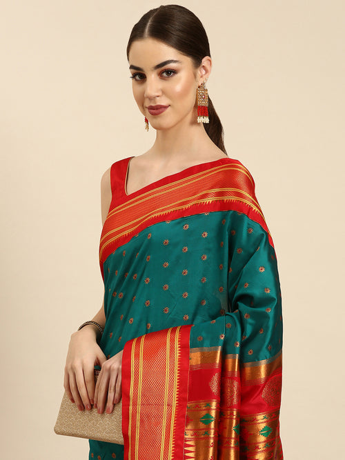 Double pallu paithani saree soft silk in rama green and red with chakra phool meena butti - closeup view showing fabric and zari work for party wear