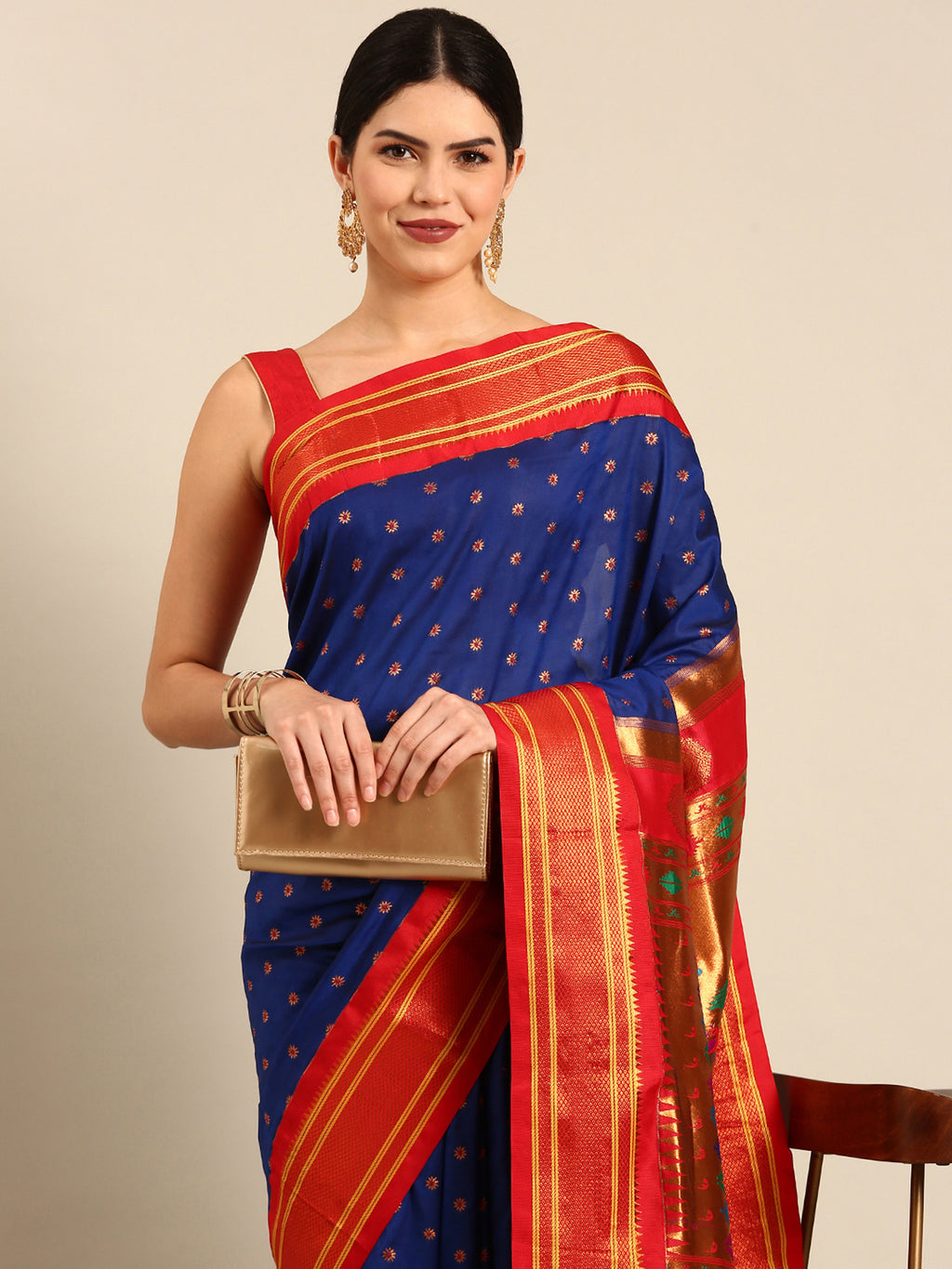 Double pallu paithani saree silk blend in royal blue and red with chakra phool meena butti - closeup view showing fabric and zari work for party wear