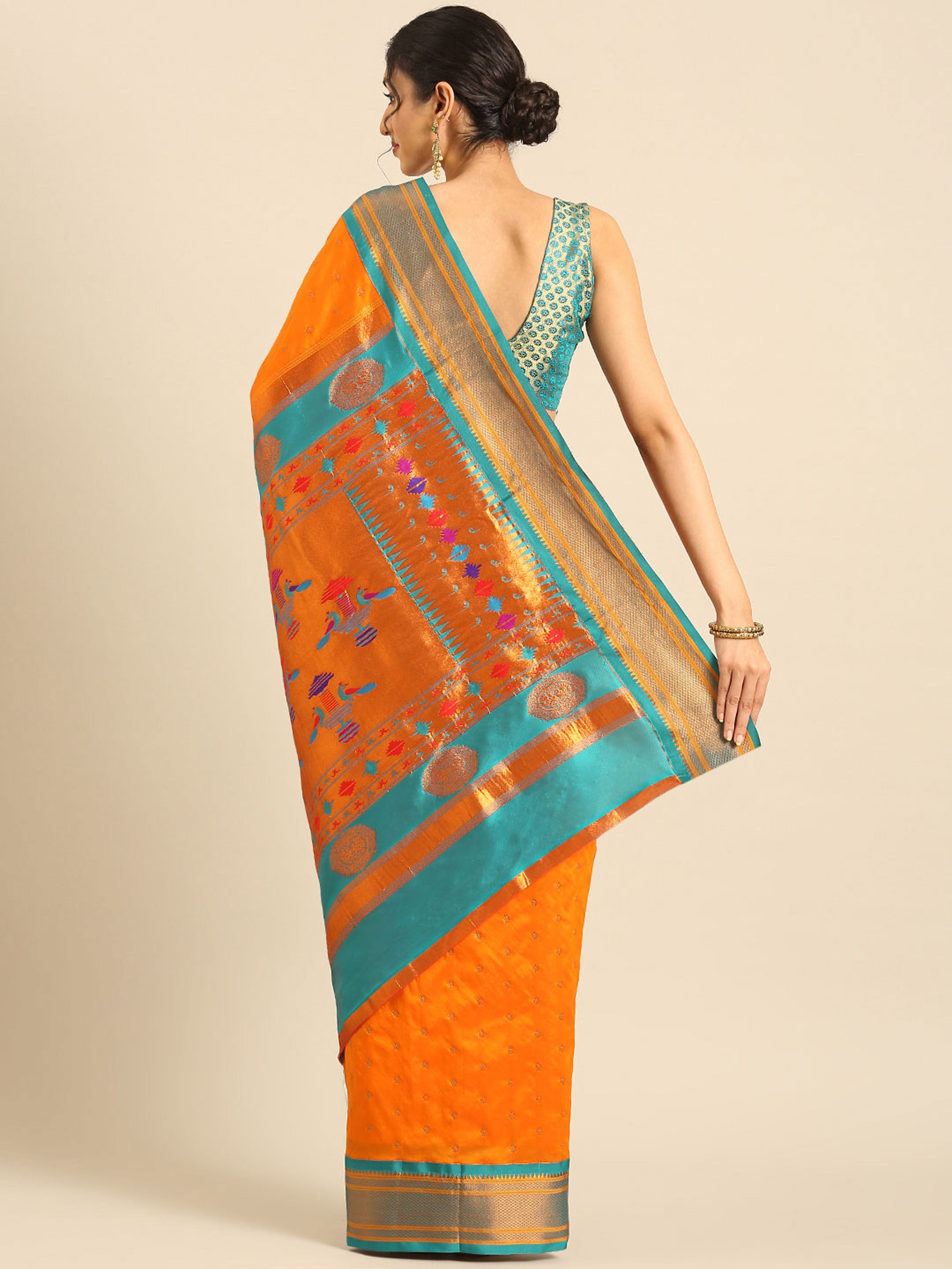 Double pallu paithani saree silk blend in saffron and rama with chakra phool meena butti - back view showing pallu and border for party wear