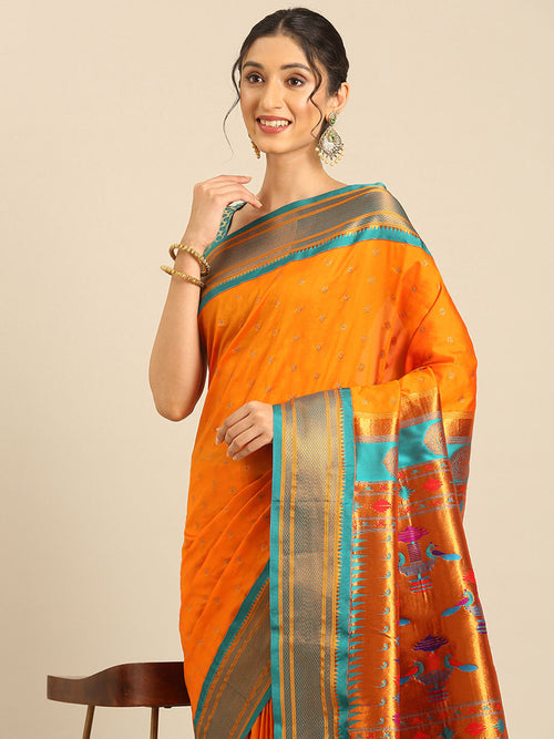 Double pallu paithani saree soft silk in saffron and rama with chakra phool meena butti - closeup view showing fabric and zari work for party wear