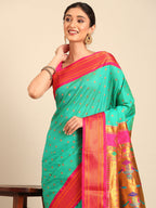 Double pallu paithani saree silk blend in sea green and pink with chakra phool meena butti - closeup view showing fabric and zari work for party wear