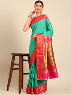 Double pallu paithani saree silk blend in sea green and pink with chakra phool meena butti - styled model view for party wear