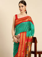 Double pallu paithani saree soft silk in sea green and red with chakra phool meena butti - closeup view showing fabric and zari work for party wear