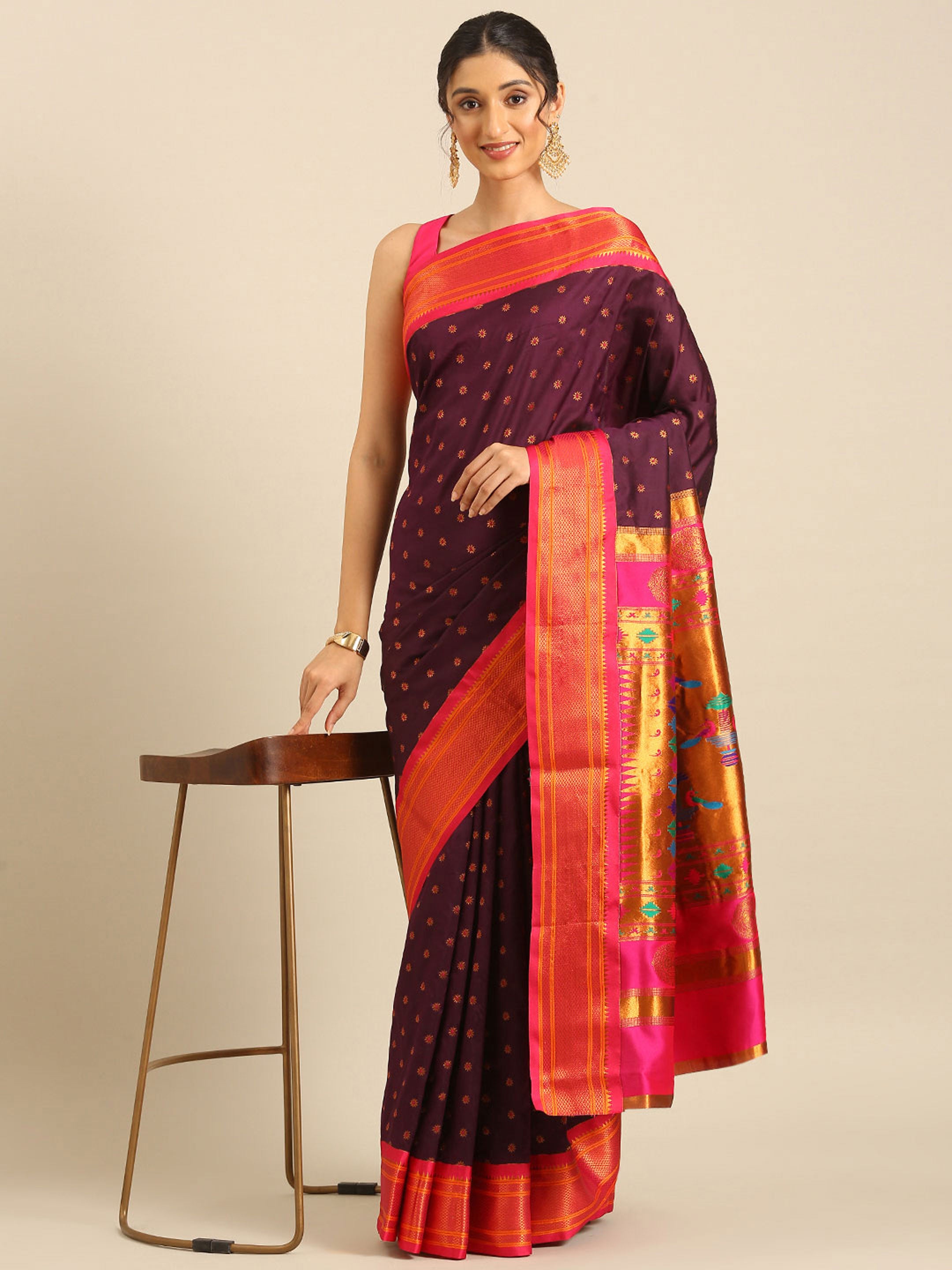 Double pallu paithani saree silk blend in wine and pink with chakra phool meena butti - styled model view for party wear