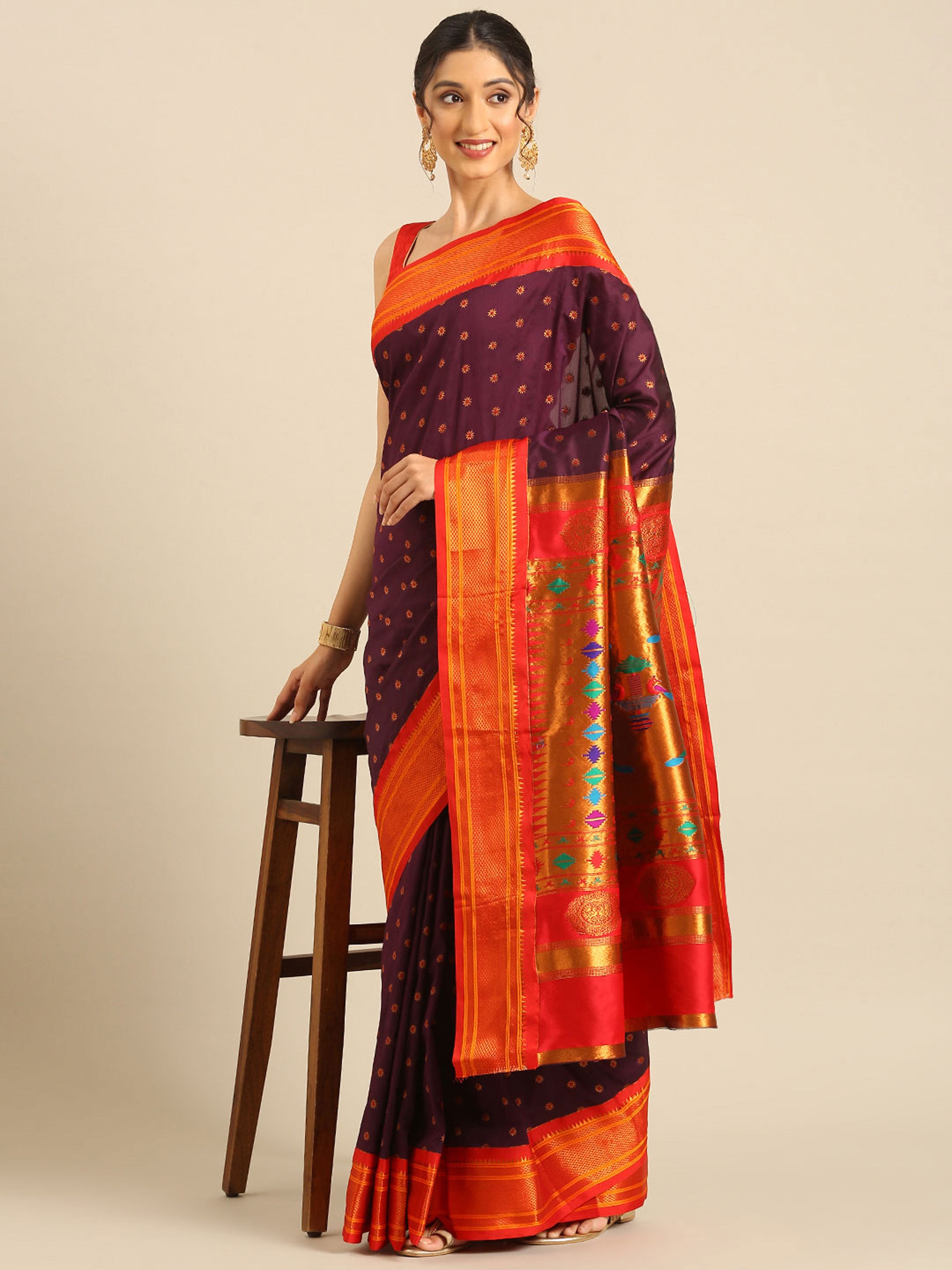 Double pallu paithani saree silk blend in wine red with chakra phool meena butti - styled model view for party wear