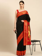 Double pallu paithani saree silk blend in black and red with zari star butti - front view for wedding wear