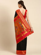 Double pallu paithani saree silk blend in black and red with zari star butti - back view showing pallu and border for wedding wear