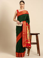 Double pallu paithani saree silk blend in bottle green and red with zari star butti - front view for wedding wear