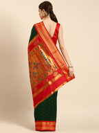 Double pallu paithani saree silk blend in bottle green and red with zari star butti - back view showing pallu and border for wedding wear