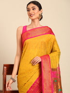 Double pallu paithani saree silk blend in mustard yellow and pink with zari star butti - closeup view showing fabric and zari work for wedding wear