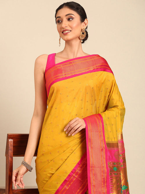 Double pallu paithani saree soft silk in mustard yellow and pink with zari star butti - closeup view showing fabric and zari work for wedding wear