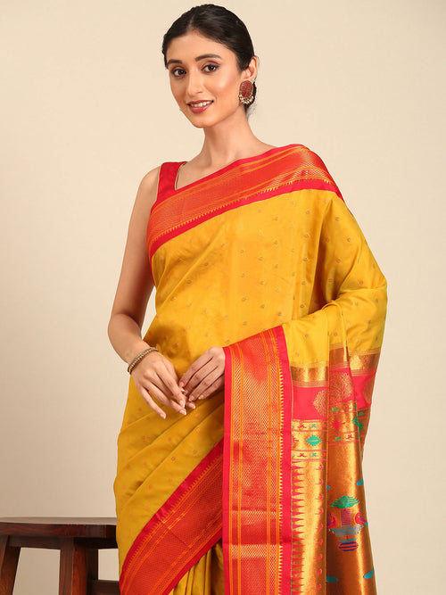 Double pallu paithani saree soft silk in mustard yellow and red with zari star butti - closeup view showing fabric and zari work for wedding wear