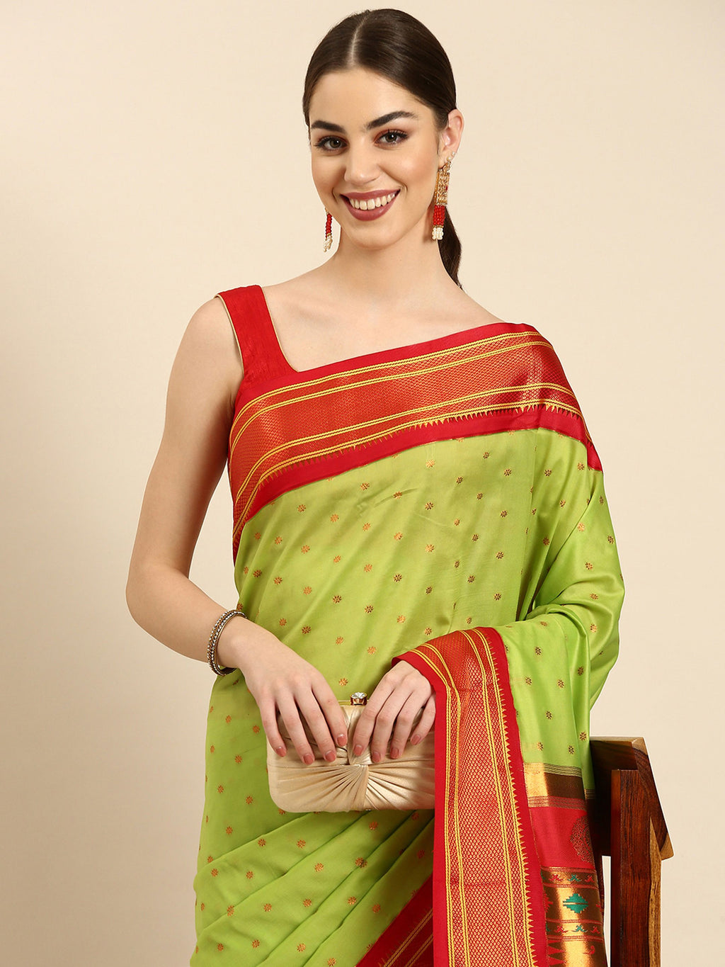 Double pallu paithani saree silk blend in popati and red with zari star butti - closeup view showing fabric and zari work for wedding wear