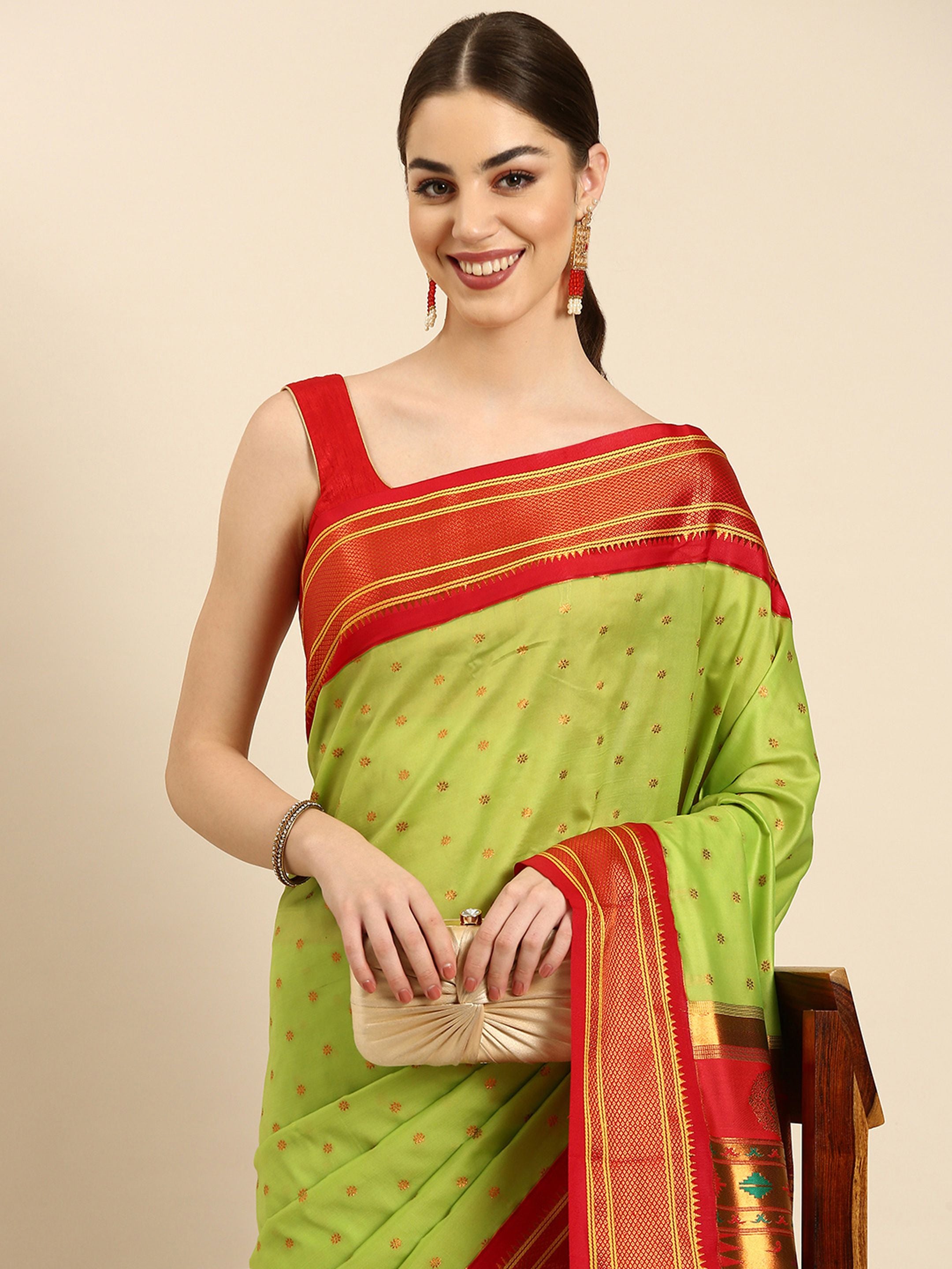 Double pallu paithani saree silk blend in popati and red with zari star butti - closeup view showing fabric and zari work for wedding wear