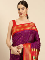 Double pallu paithani saree silk blend in purple and red with zari star butti - closeup view showing fabric and zari work for wedding wear