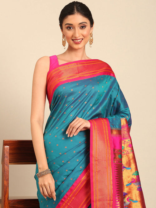 Double pallu paithani saree soft silk in rama green and pink with zari star butti - closeup view showing fabric and zari work for wedding wear