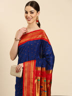 Double pallu paithani saree silk blend in royal blue and red with zari star butti - closeup view showing fabric and zari work for wedding wear