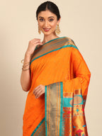 Double pallu paithani saree silk blend in saffron and rama with zari star butti - closeup view showing fabric and zari work for wedding wear