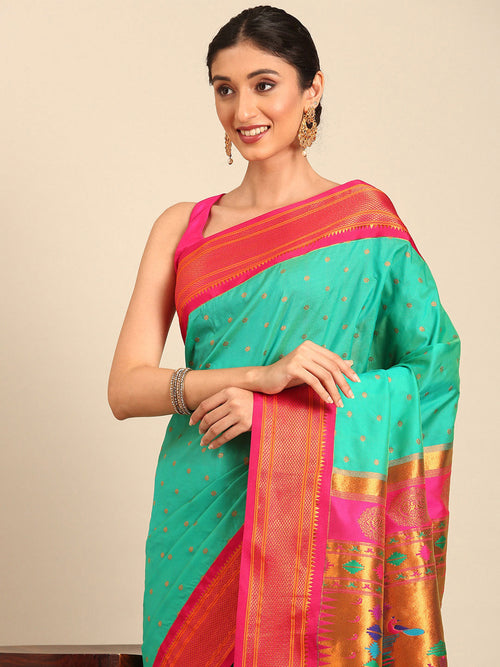 Double pallu paithani saree soft silk in sea green and pink with zari star butti - closeup view showing fabric and zari work for wedding wear