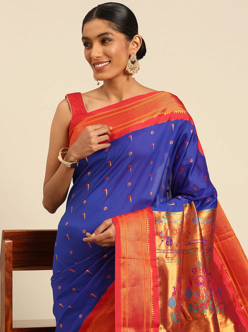 Muniya paithani saree soft silk in royalblue red with muniya and flower meena butti - closeup view showing fabric and zari work for wedding wear