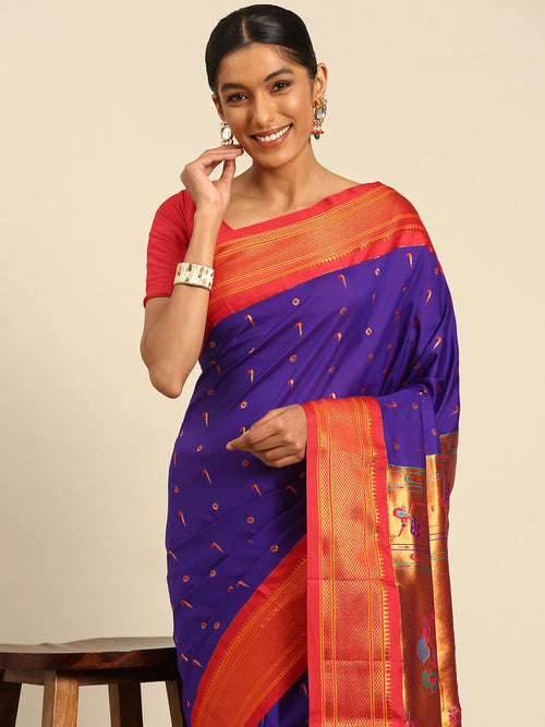 Muniya paithani saree soft silk in violet red with muniya and flower meena butti - closeup view showing fabric and zari work for wedding wear